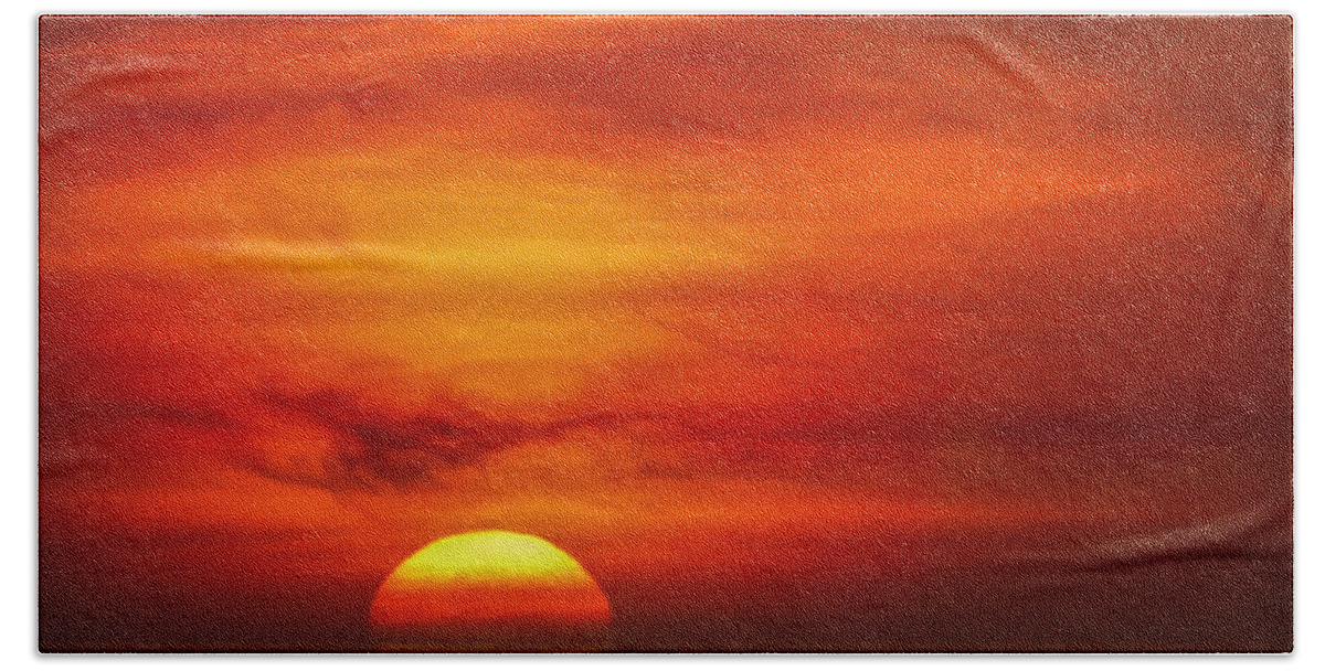 Sunset Beach Towel featuring the photograph Zoomed while sinking Sun by Hanny Heim