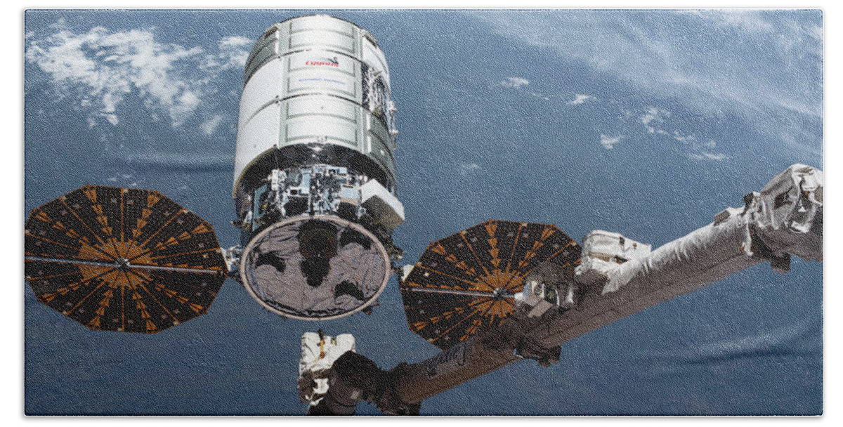 2019 Beach Towel featuring the photograph Cygnus Spacecraft Docks At The Iss #1 by Science Source