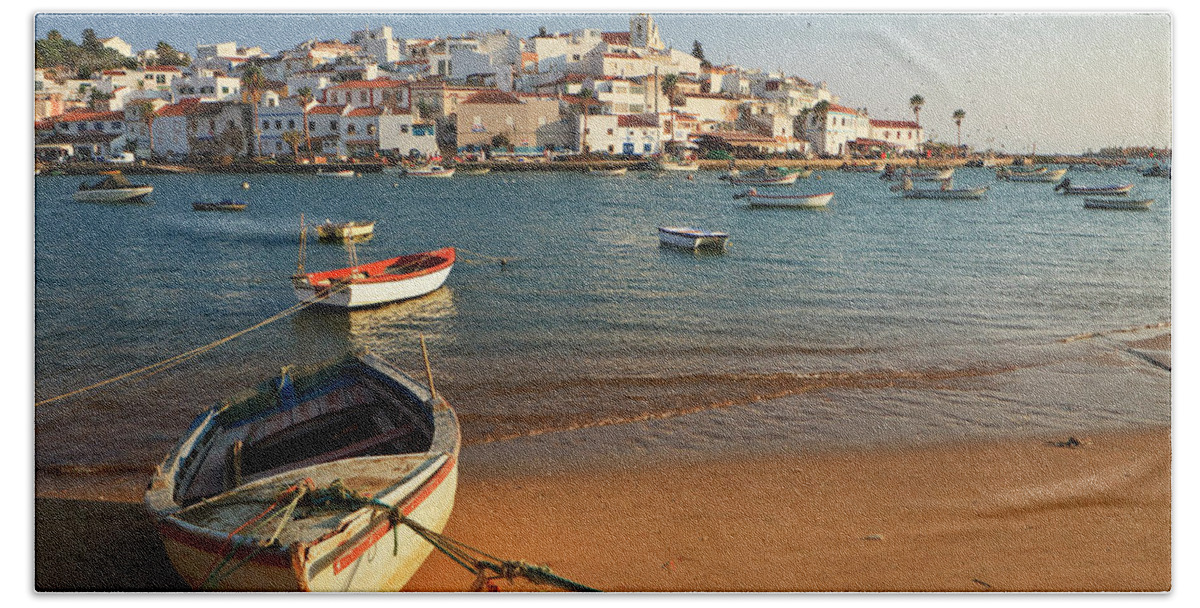 Estock Beach Towel featuring the digital art Portugal, Faro, Ferragudo, Atlantic Ocean, Algarve, The Fishing Village Of Ferragudo Near Portimao #2 by Luigi Vaccarella