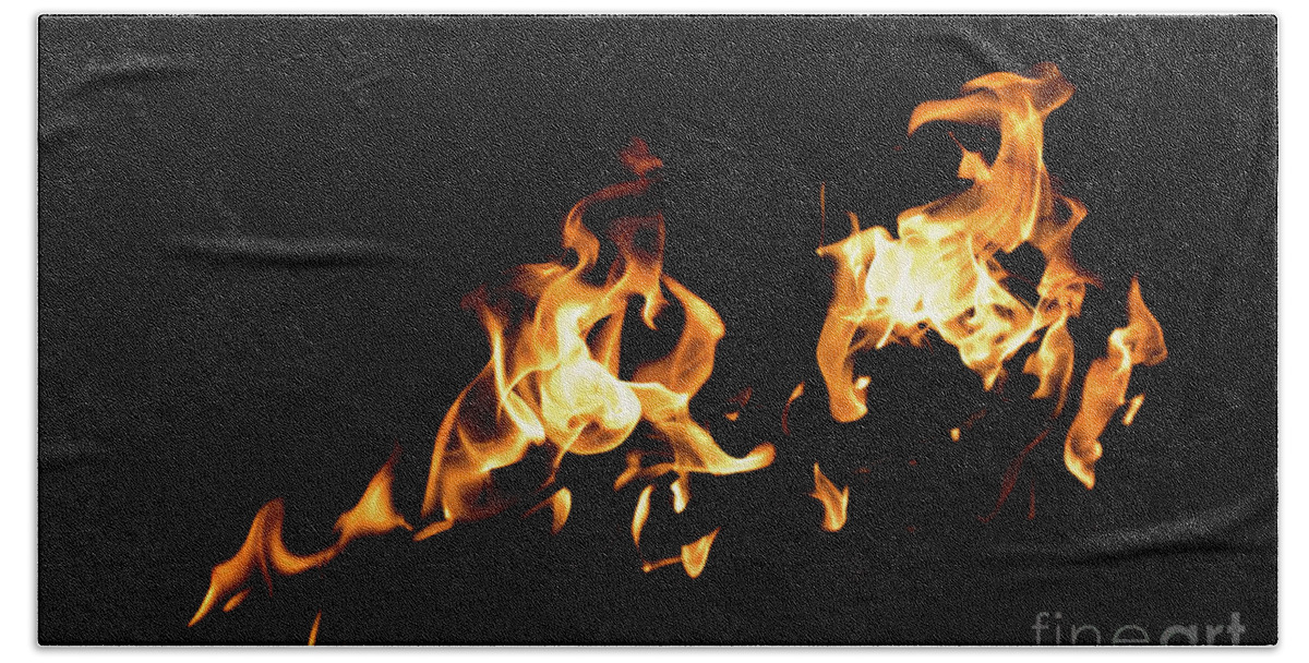 Background Beach Towel featuring the photograph Flames in the fire of a red and yellow barbecue. #3 by Joaquin Corbalan