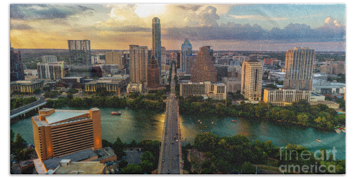 Aerial View Beach Sheet featuring the photograph Aerial view of the Austin Skyline as bat watchers fill the Congress Avenue Bridge to watch the bats take flight by Dan Herron