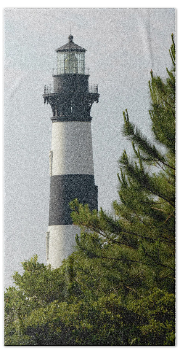 Bodie Island Beach Towel featuring the photograph Bodie Island Lighthouse Through the Trees by Jimmie Bartlett