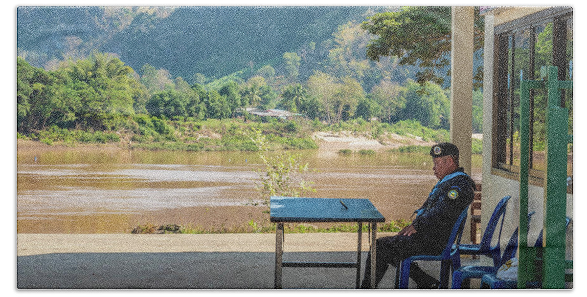 Laos Beach Towel featuring the photograph Border guard hard at work by Jeremy Holton