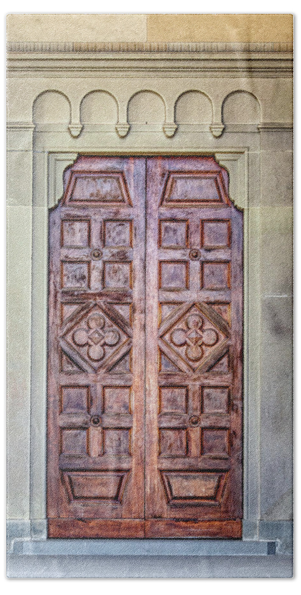 Medieval Beach Towel featuring the photograph Carved Door of Cortona by David Letts