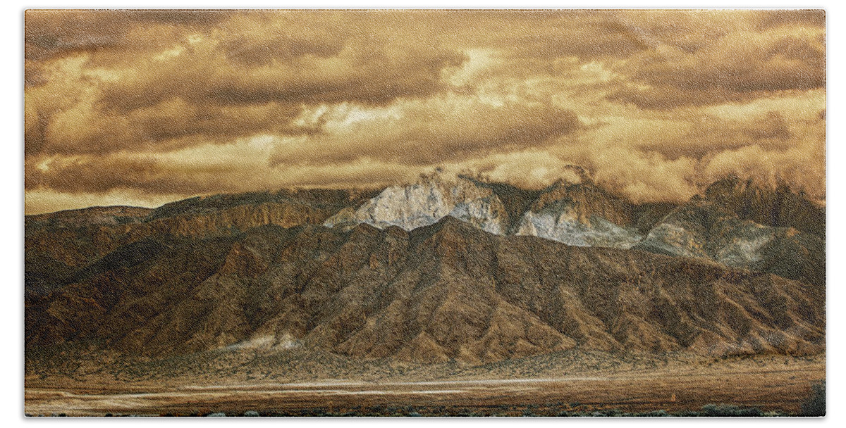 Mountain Beach Towel featuring the photograph Cloudy Day Over the Sandias by Michael McKenney
