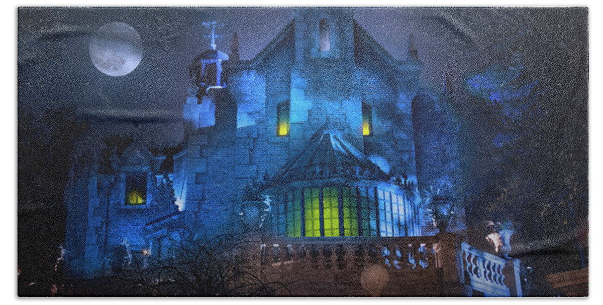 Magic Kingdom Beach Towel featuring the photograph Disney World's Haunted Mansion by Mark Andrew Thomas