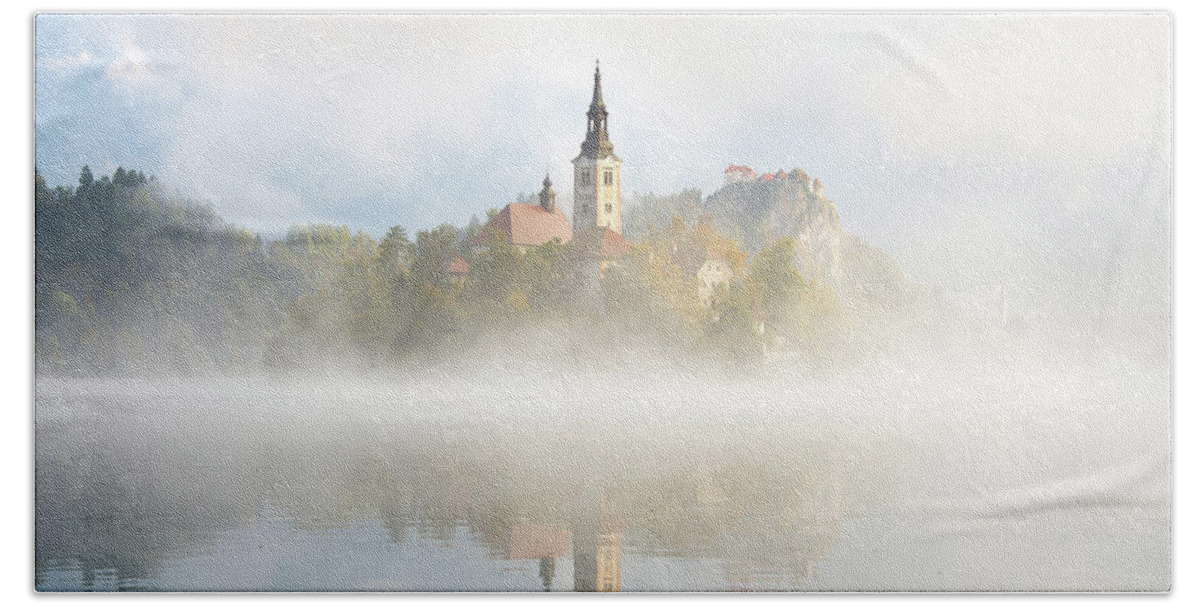 Bled Beach Towel featuring the photograph Fog over the water at Bled Lake by IPics Photography
