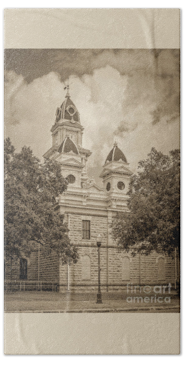 Goliad Courthouse In Sepia Beach Towel featuring the photograph Goliad Courthouse in Sepia by Imagery by Charly