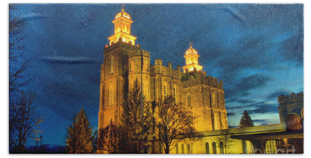 Logan Ut Beach Towel featuring the photograph Logan Temple Glowing Under The Clouds by Adam Jewell