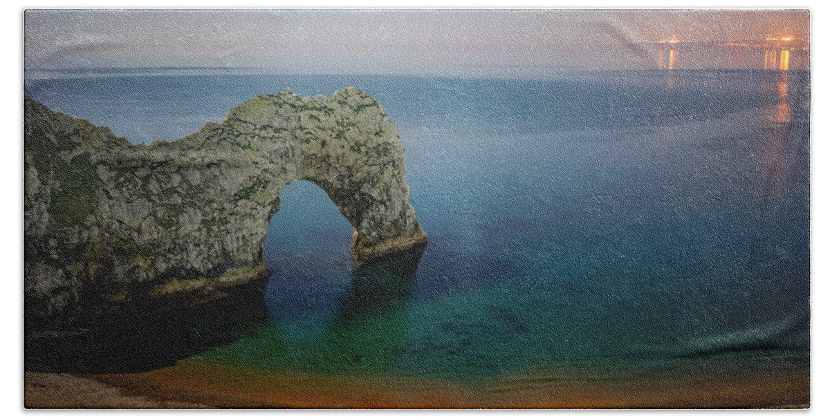 Durdle Door Beach Towel featuring the photograph Midnight at Durdle Door by George Afostovremea