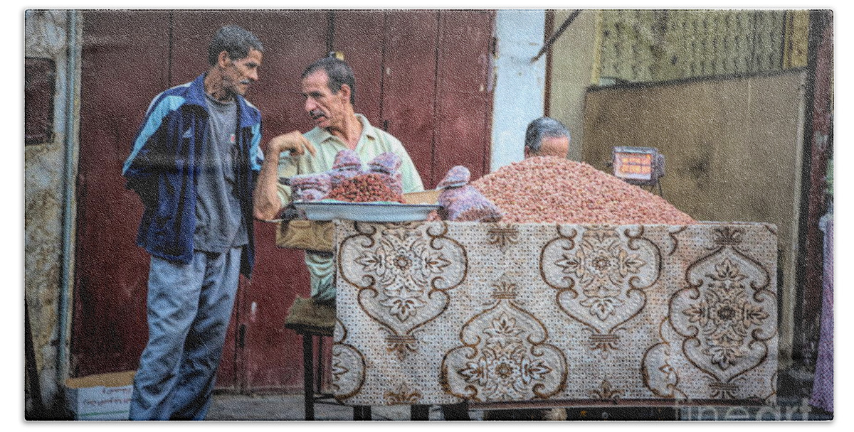 Morocco Beach Towel featuring the photograph Moroccan Selling Nuts Streets of Fes by Chuck Kuhn