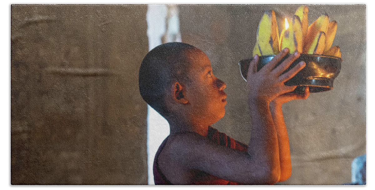 Boy Beach Towel featuring the photograph Novice Monk Making An Offering by Ann Moore