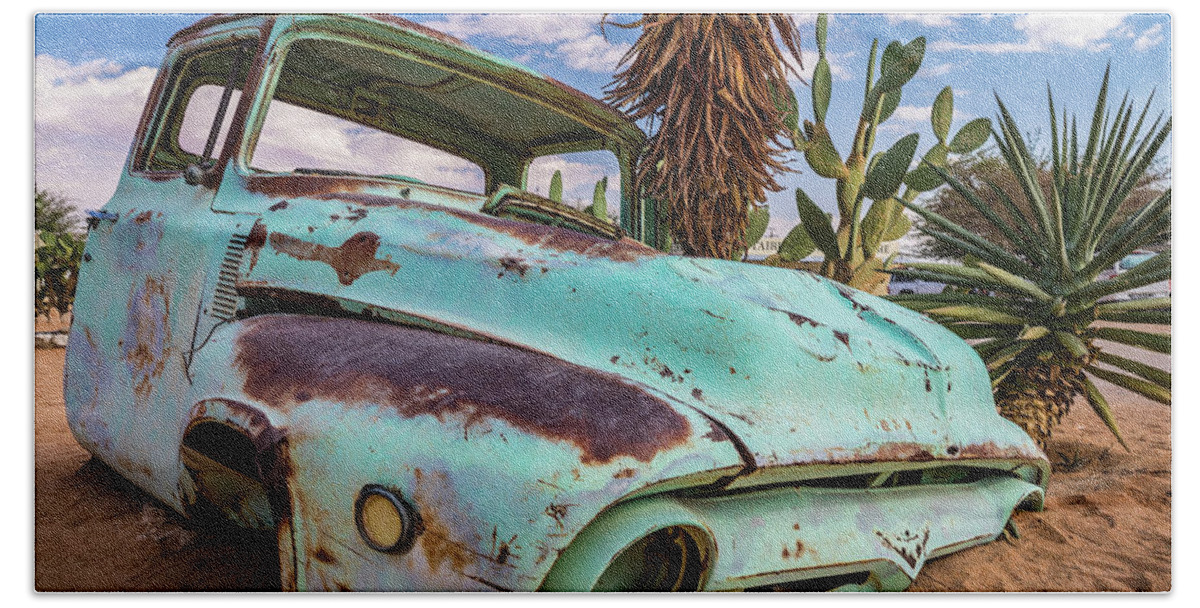 Car Beach Towel featuring the photograph Old and abandoned car #7 in Solitaire, Namibia by Lyl Dil Creations