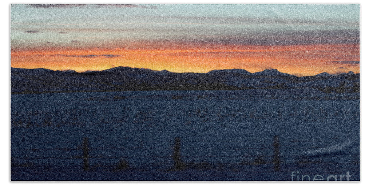 The Cowboy Trail Beach Towel featuring the photograph Rocky Mountain Sunset by Ann E Robson