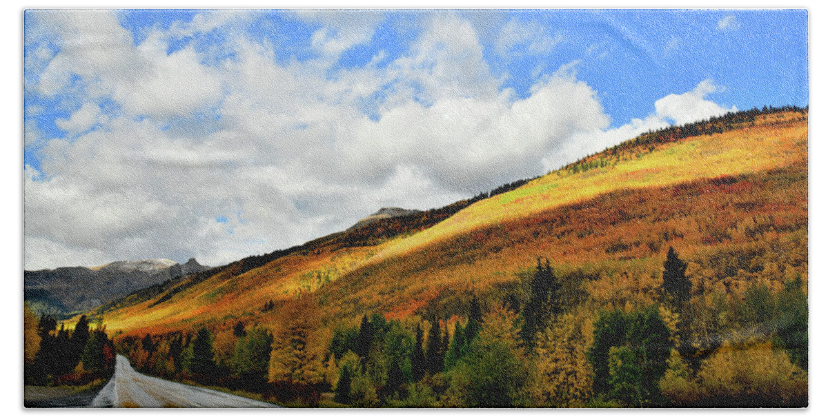 Red Mountain Pass Beach Towel featuring the photograph Spotlight on Fall Colors along Million Dollar Highway by Ray Mathis