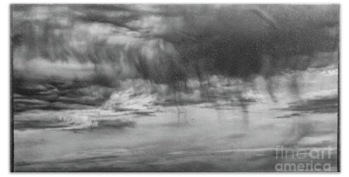 Cloud Beach Towel featuring the photograph Stormy sky in black and white by Lyl Dil Creations