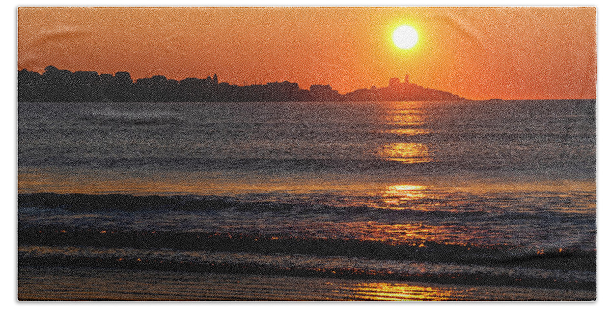 York Beach Towel featuring the photograph Sunrise over the Nubble Lighthouse from Long Sands Beach Long Beach York Maine by Toby McGuire