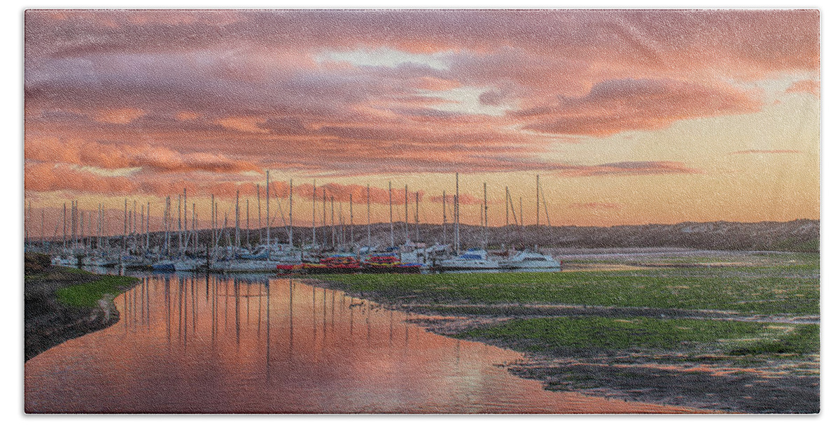 Sunset Beach Towel featuring the photograph Sunset Over the Marina by Bill Roberts