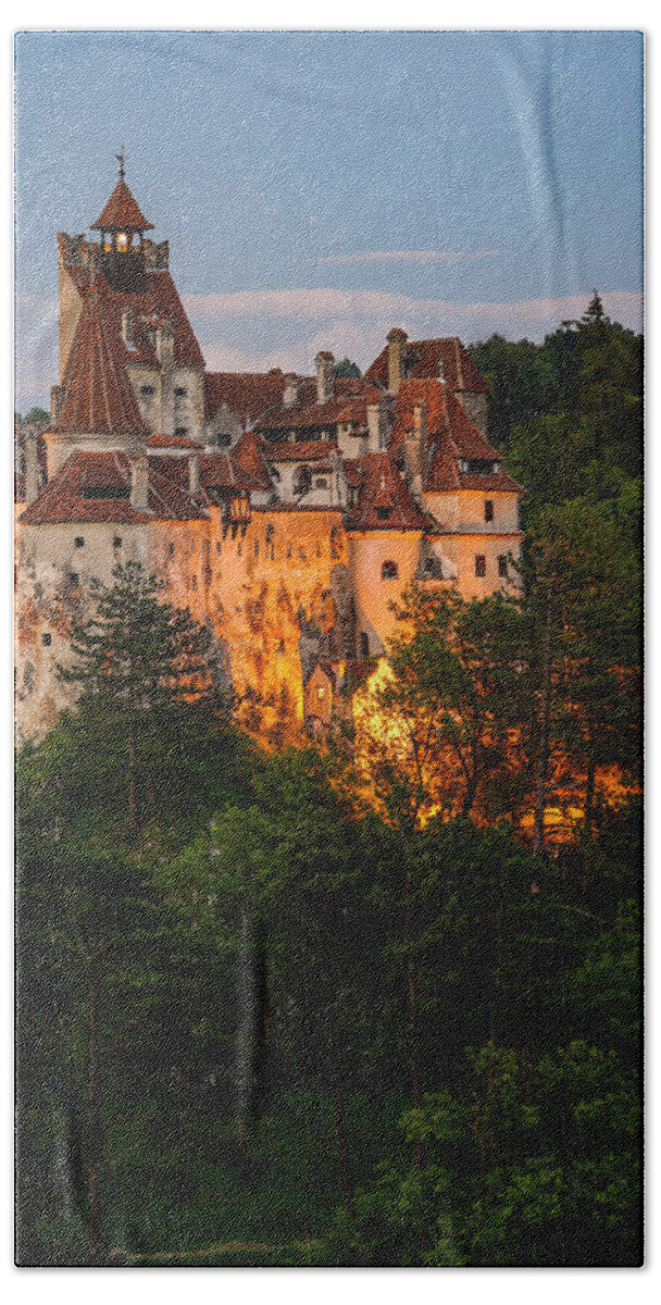 Castle Beach Towel featuring the photograph The beautiful Bran castle, also known as Dracula's castle, in Transylvania, Romania. by George Afostovremea