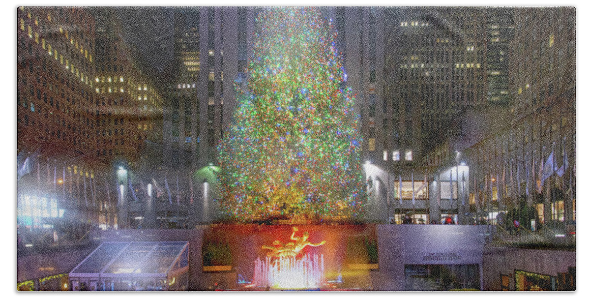 Rockefeller Center Beach Towel featuring the photograph The Christmas Tree at Rockefeller Center by Mark Andrew Thomas