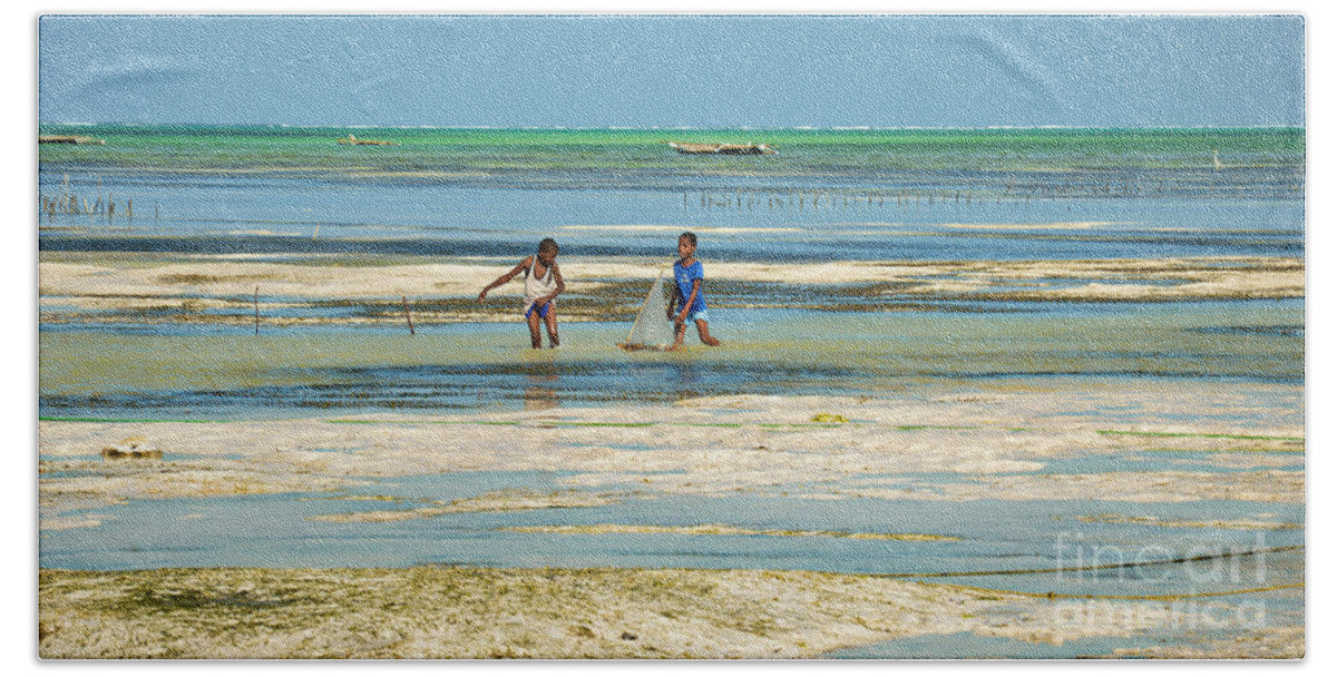 Boy Beach Towel featuring the photograph The future sailors in Zanzibar by Yavor Mihaylov