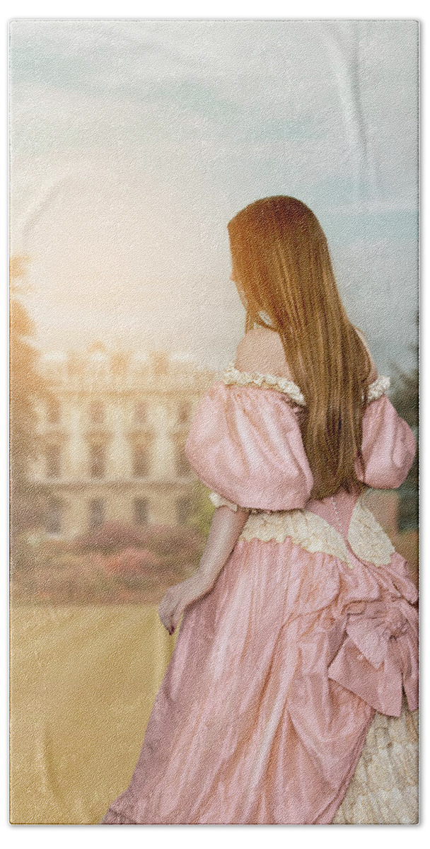 Historical Beach Sheet featuring the photograph Victorian Woman In A Pink Dress With Mansion And Grounds by Ethiriel Photography