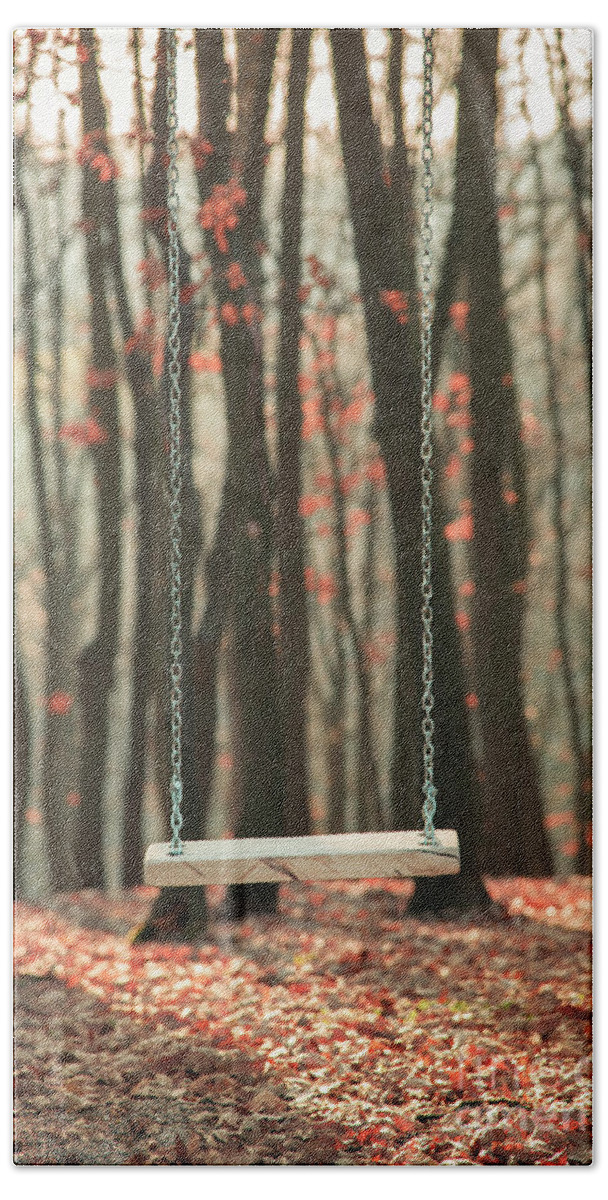 Swing Beach Sheet featuring the photograph Wooden swing in autumn forest by Jelena Jovanovic