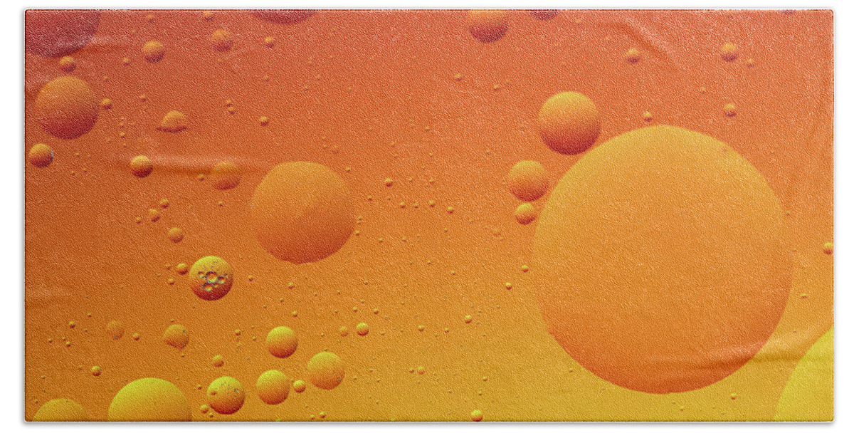 Connection Beach Towel featuring the photograph Bright abstract, yellow background with flying bubbles by Michalakis Ppalis