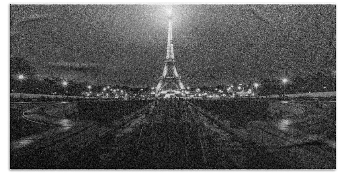Eiffel Tower Beach Towel featuring the photograph Eiffel Tower in Paris seen at night #1 by George Afostovremea