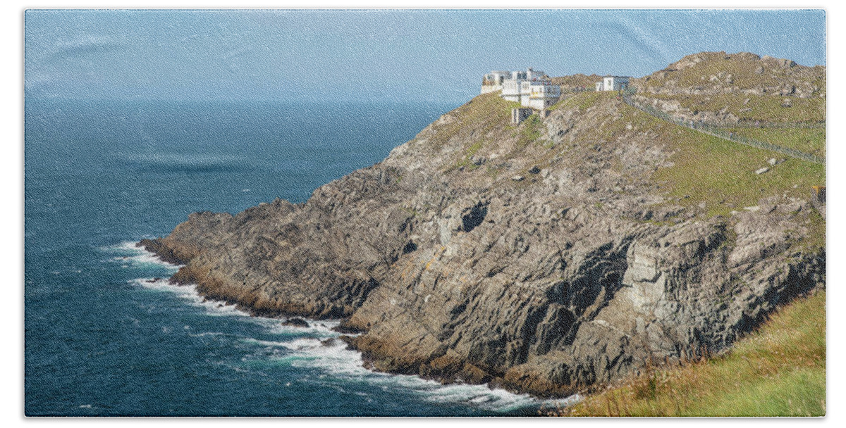 Mizen Head Beach Towel featuring the photograph Mizen Head Signal Station lighthouse with dramatic rocky coastline in the Atlantic ocean . County Cork, Ireland. #1 by Michalakis Ppalis