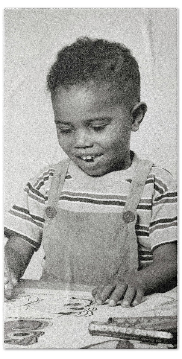 B&w Black And White 1940s 1950s African-american Black Ethnicity Black Boy Busy Cheerful Child Choice Coloring Crayons Creative Direction Discovery Drawing Excitement Expression Fat Fun Future Half-length Happy Home Life Humor Indoors Joy Juvenile Kid Laughing Lifestyle Male Person Pleased Portrait Pride Promise Recreation Single Sitting Smiling Strength Stylish Suburban Success Table Toddler Urban Wellness Working Retro Vintage Nostalgia Nostalgic Old Fashioned Old Fashion Old Time Classic Beach Towel featuring the photograph 1940s 1950s creative smiling African-American boy toddler sitting at table working drawing by Panoramic Images