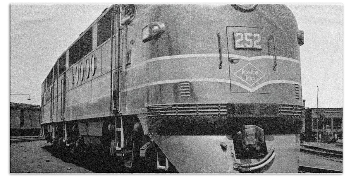 B&w Black And White 1940s 1950s 1939-1945 Adults Alone America American Anonymous Built By Carrier Diesel Electric Electro-motive Division Engineer Engine Exterior Freight Full-length Ggeneral Motors Head On Industry Line Locomotive Logo Low Angle Occupations Outdoors Pa Pennsylvania Powerful Railroad Railway Rail Reading Lines Reading Single Streamline Stylish Suburban Trains Transportation Travel Urban Usa Victory View Window Retro Vintage Nostalgic Old Fashioned Old Fashion Old Time Classic Beach Towel featuring the photograph 1940s head on reading lines diesel electric railroad engine model EMD FT built by General Motors by Panoramic Images