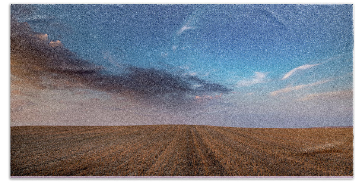 Nightfall Beach Towel featuring the photograph Agricultural meadow field and cloudy sky during sunset. by Michalakis Ppalis