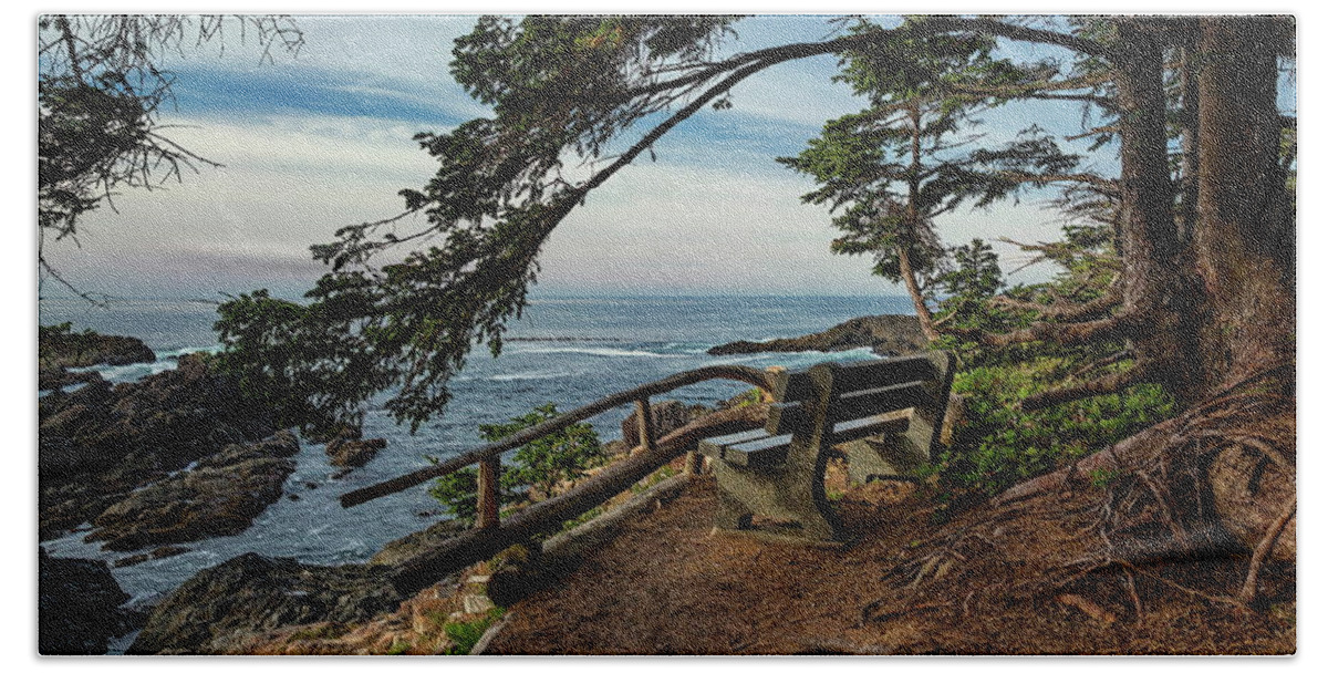 Alex Lyubar Beach Towel featuring the photograph A bench on the cliff over the seashore by Alex Lyubar
