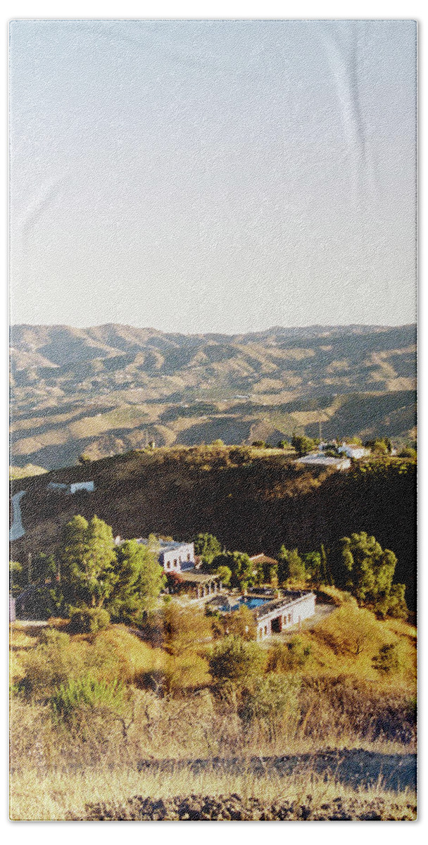 Travel Beach Towel featuring the photograph A house up in the mountains by Barthelemy de Mazenod