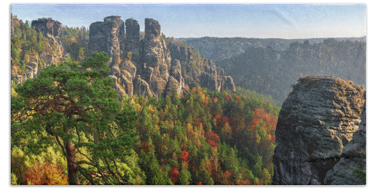 Saxon Switzerland Beach Towel featuring the photograph After sunrise on the Bastei rocks by Sun Travels