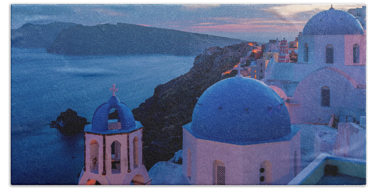 Aegean Sea Beach Towel featuring the photograph Blue Domes Of Santorini by Evgeni Dinev