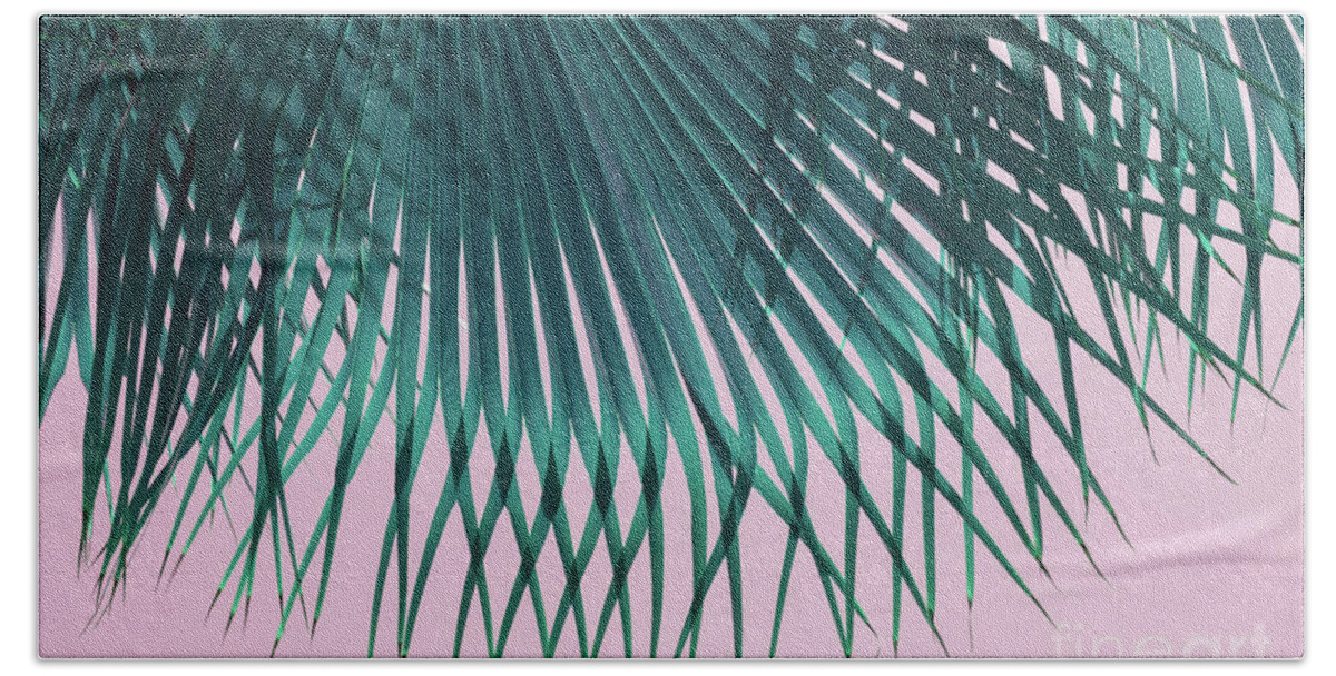 Palm Leaf Beach Towel featuring the photograph Blue green palm leaf and pink sky on the beach by Adriana Mueller