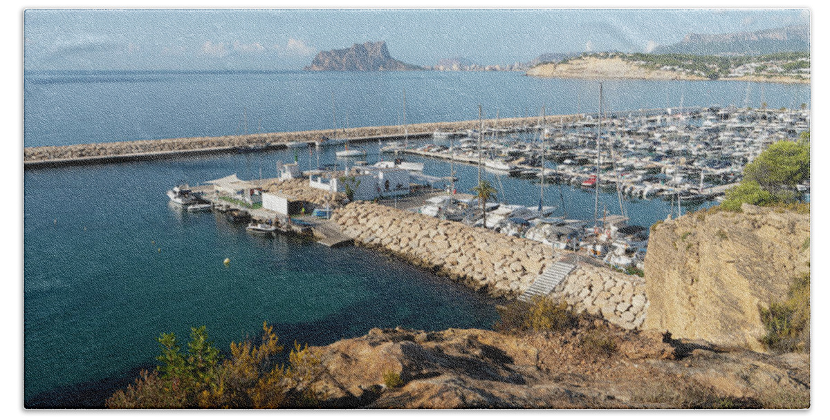 Mediterranean Coast Beach Towel featuring the photograph Blue Mediterranean Sea and marina in Moraira 1 by Adriana Mueller