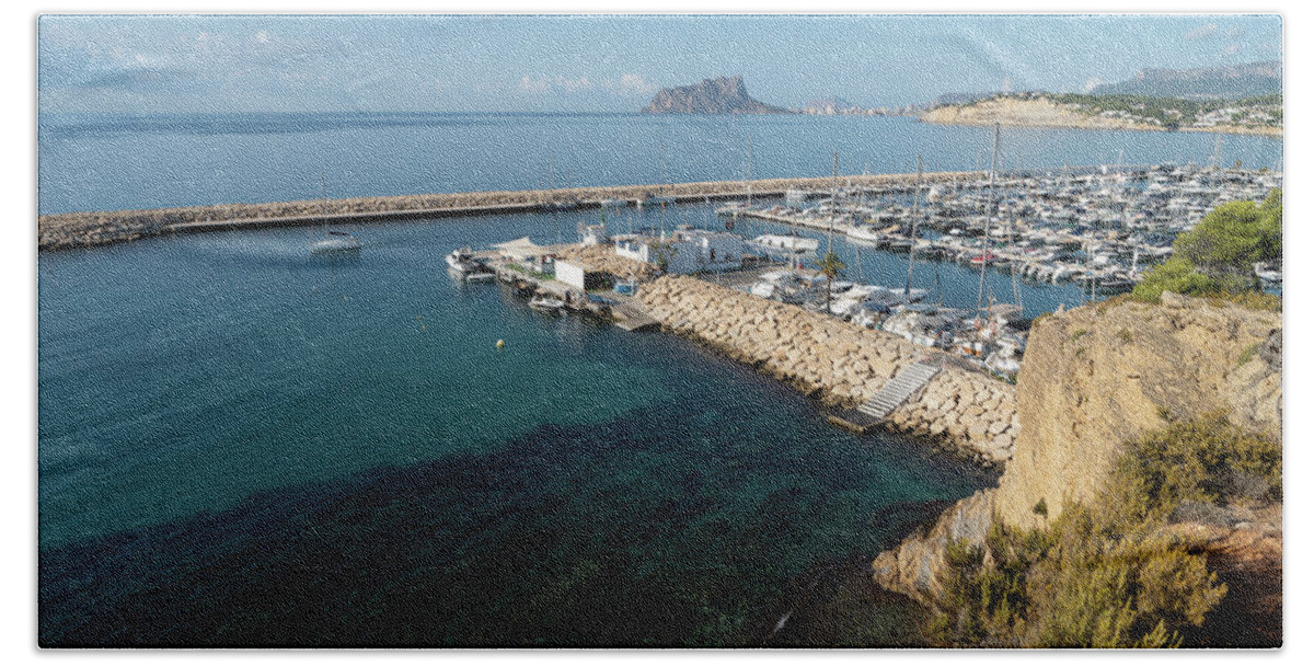 Mediterranean Coast Beach Towel featuring the photograph Blue Mediterranean Sea and marina in Moraira 2 by Adriana Mueller