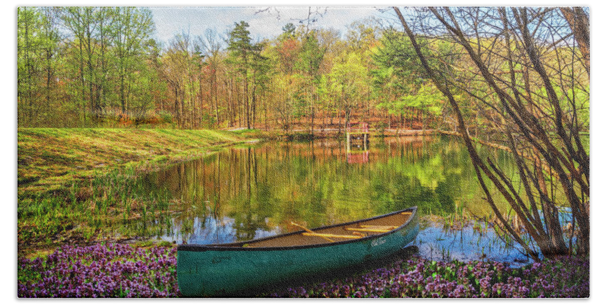 Benton Beach Towel featuring the photograph Canoe in the Spring Wildflowers at the Lake by Debra and Dave Vanderlaan