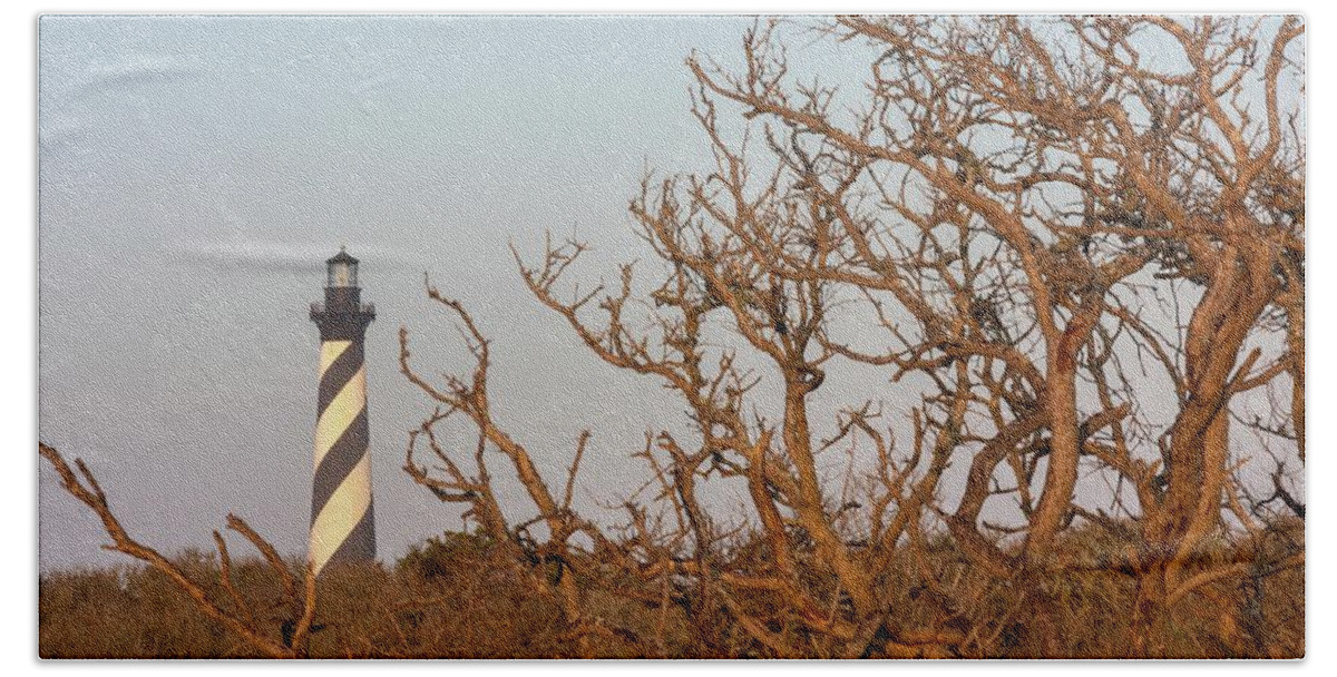 Architecture Beach Sheet featuring the photograph Cape Hatteras Lighthouse Through the Brush by Liza Eckardt