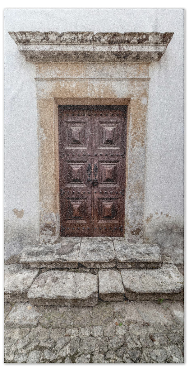 Europe Beach Towel featuring the photograph Carved Door of Medieval Obidos by David Letts