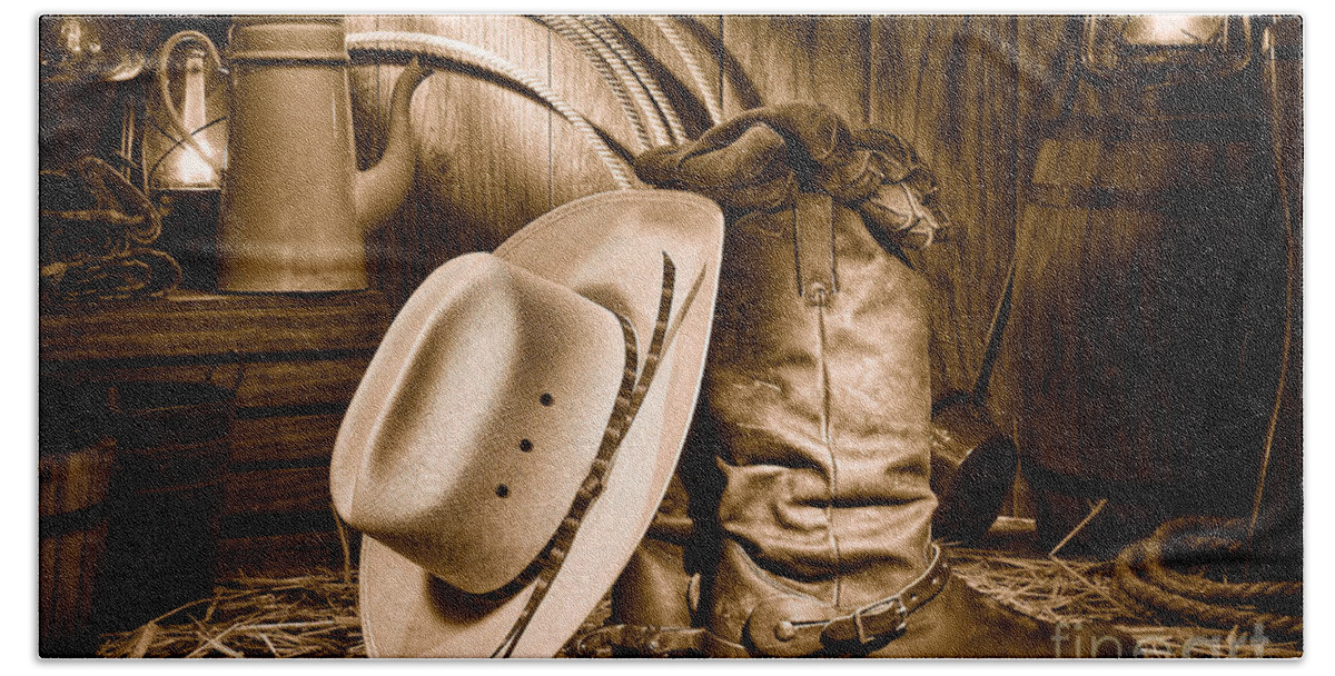 Cowboy Beach Towel featuring the photograph Cowboy Gear in Barn - Sepia by Olivier Le Queinec