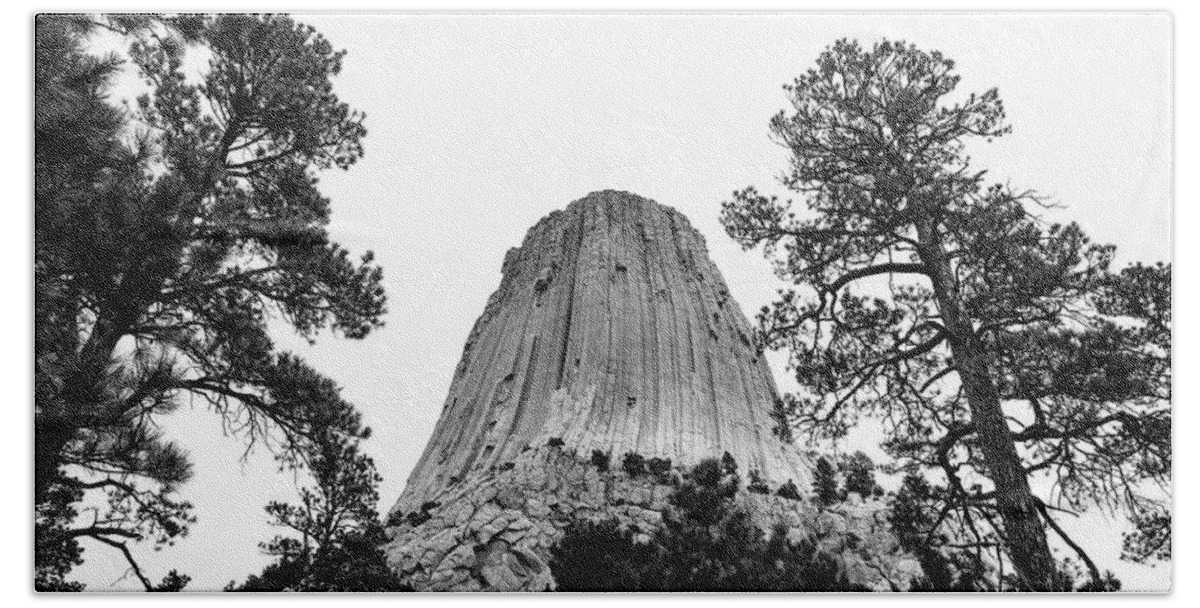 Devils Tower Long Exposure Beach Towel featuring the photograph Devils Tower Black And White Base View by Dan Sproul