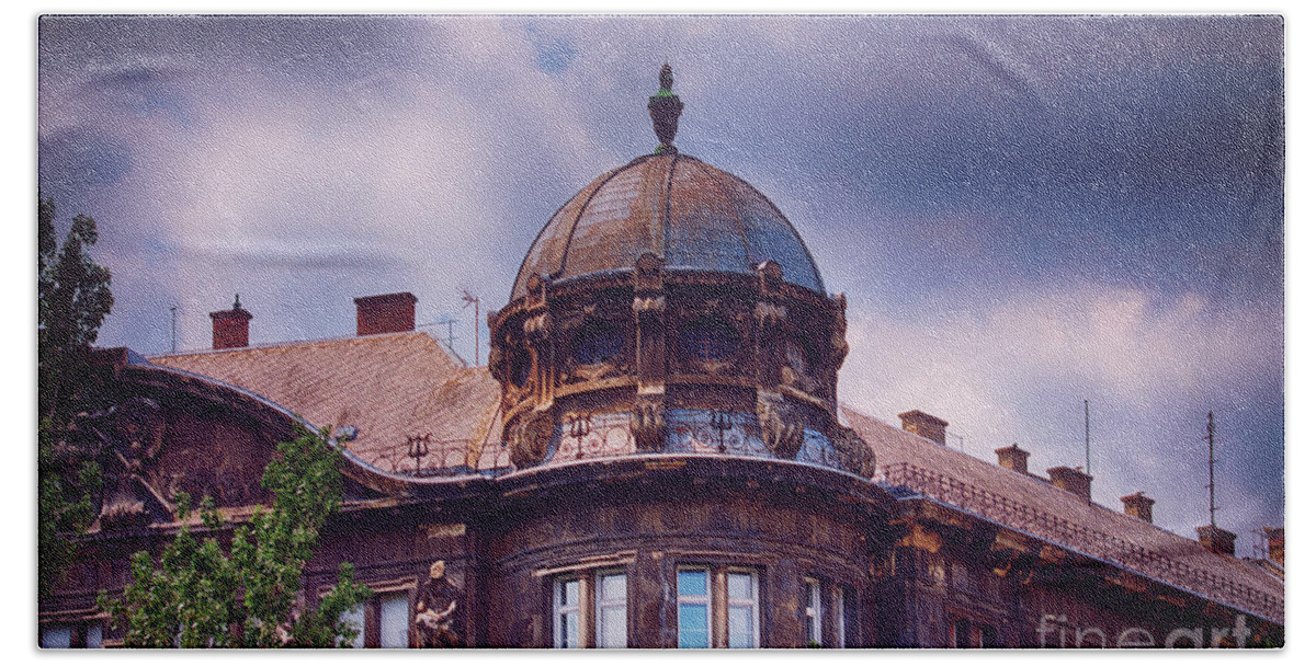 Building Beach Towel featuring the photograph Domed old building with dark blue stormy clouds by Mendelex Photography