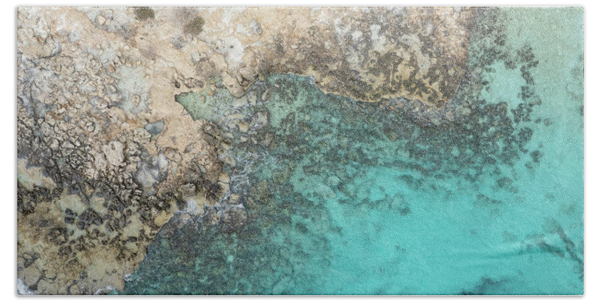 Rocky Beach Beach Towel featuring the photograph Drone aerial of rocky sea coast with transparent turquoise water. Seascape top view by Michalakis Ppalis