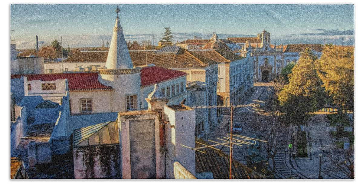Faro Portugal Beach Towel featuring the photograph Faro Portugal rooftops in the morning light by Tatiana Travelways