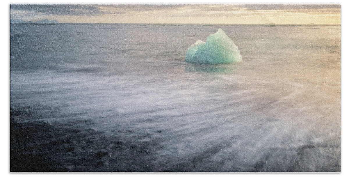 Iceberg Beach Towel featuring the photograph Iceberg at Diamond Beach in Iceland at sunrise by Alexios Ntounas
