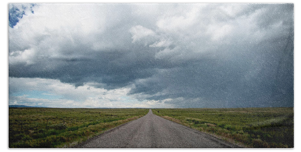 Storm Beach Towel featuring the photograph Idaho Stormy Road by Wesley Aston